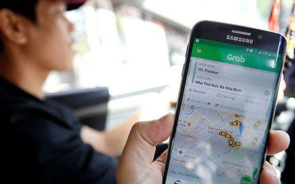 p/Uber, Grab được xếp vào loại hình kinh doanh vận tải hành khách bằng taxi tính tiền thông qua phần mềm. Ảnh: S.T