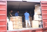 Bắt 2 toa tàu chở hàng chục tấn linh kiện điện tử lậu tại ga Biên Hòa