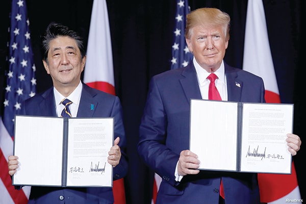 p/Tổng thống Mỹ Donald Trump và Thủ tướng Nhật Shinzo Abe đã ký kết thỏa thuận thương mại sơ bộ bên lề Đại hội đồng Liên Hợp Quốc lần thứ 74.