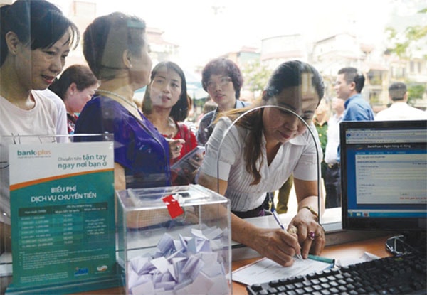 Ví điện tử Bank Plus ra đời theo thỏa thuận hợp tác giữa Viettel và MBBank (Ảnh: Tiểu thương chợ Đồng Xuân đăng ký dùng dịch vụ BankPlus)