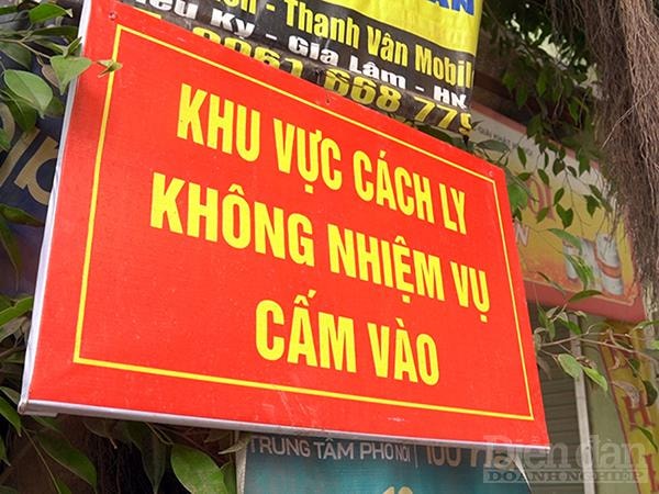 Công tác cách ly được tiến hành rất nhanh chóng để khoanh vùng ổ dịch. Ảnh: Quốc Tuấn