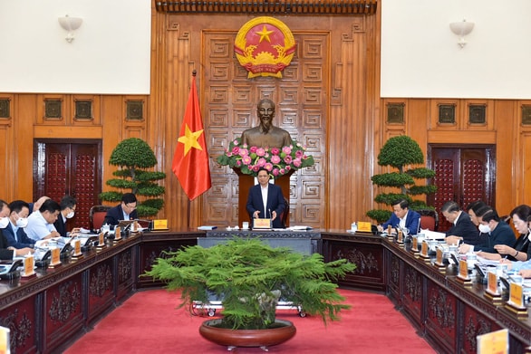 Chương trình tổng thể phục hồi kinh tế được các thành viên Chính phủ thảo luận - Ảnh: VGP