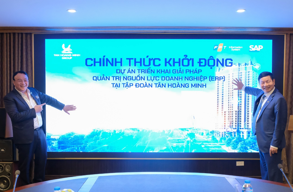 Ông Đỗ Anh Dũng - Chủ tịch, TGĐ Tập đoàn Tân Hoàng Minh và ông Trương Gia Bình - Chủ tịch HĐQT Tập đoàn FPT chạm tayp/khởi động dự án