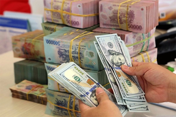 Tỷ giá VND/USD dự báo sẽ tăng trong năm 2022.