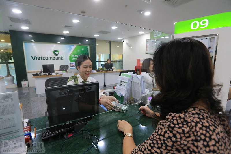 Trong bức tranh tăng trưởng tín dụng hệ thống cao nhất 10 năm qua, Vietcombank dẫn đầu hệ thống với mức 14,4% và đang được kỳ vọng sẽ tiếp tục nới room. Ảnh: Quốc Tuấn