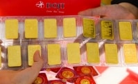 Đồng USD mất giá, vàng tăng mạnh