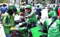 Vốn hóa startup Grab giảm bằng nửa với so với đối thủ Gojek