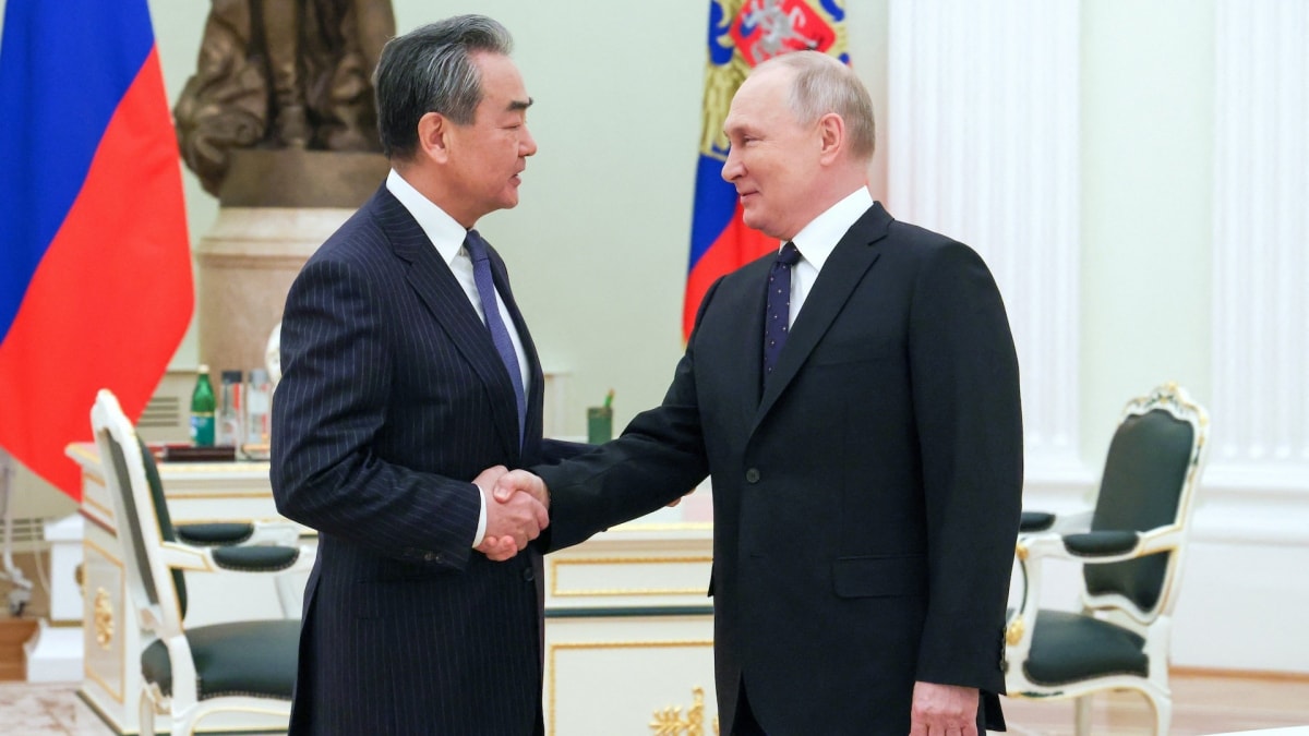 Ông Vương Nghị gặp Tổng thống Nga Putin. Ảnh: Sputnik