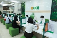 Ngân hàng hỗ trợ doanh nghiệp tái cơ cấu vượt dịch