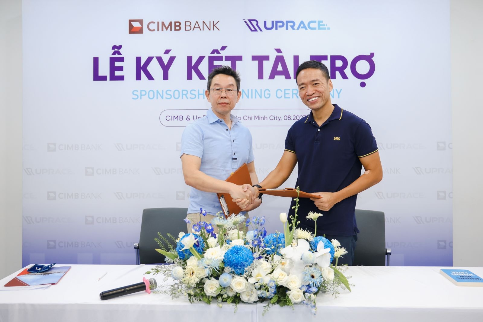 Ông Thomson Fam Siew Kat, CEO CIMB Việt Nam (trái) và ông Lê Hồng Minh, CEO VNG, Đại diện Dự án UpRace