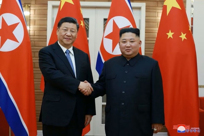 Chủ tịch Trung Quốc Tập Cận Bình và Chủ tịch Triều Tiên Kim JOng-un