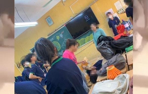 Sự việc nữ giáo viên ở trường THPT Đa Phúc (huyện Sóc Sơn, TP Hà Nội) có hành vi túm cổ áo, chửi mắng, kéo lê học sinh đang làm nóng dư luận. Ảnh cắt từ clip