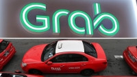 Grab muốn mua hãng taxi singapore, chính quyền lo ngại