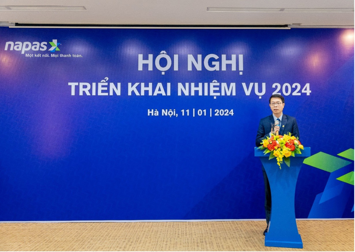 Ông Nguyễn Quang Hưng – Chủ tịch HĐQT NAPAS trình bày báo cáo kết quả hoạt động năm 2023