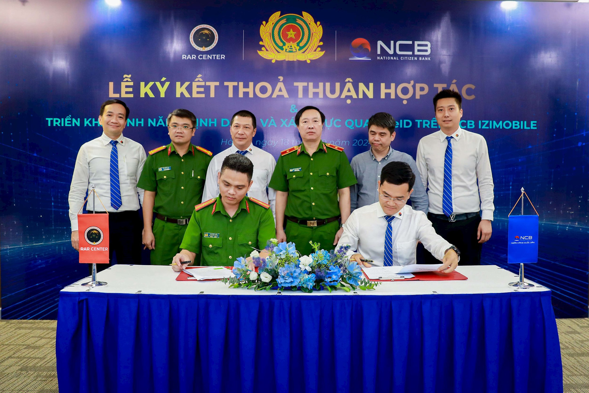 NCB và Trung tâm RAR ký thoả thuận hợp tác triển khai tính năng định danh và xác thực qua VNeID trên NCB iziMobile (1)