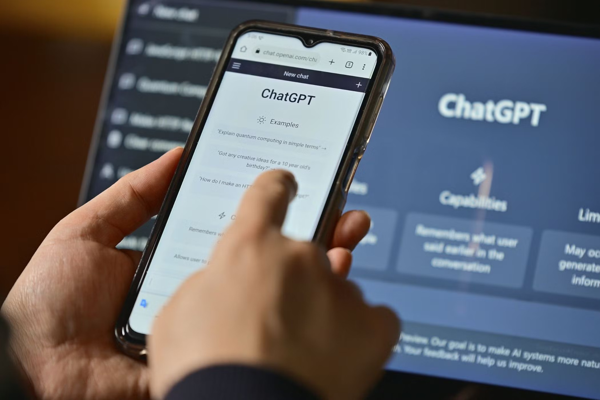 someone-using-chatgpt-on-their-smartphone-and-laptop.jpg