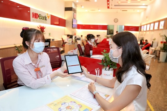 Tăng room tín dụng và hạ lãi vay thực chất